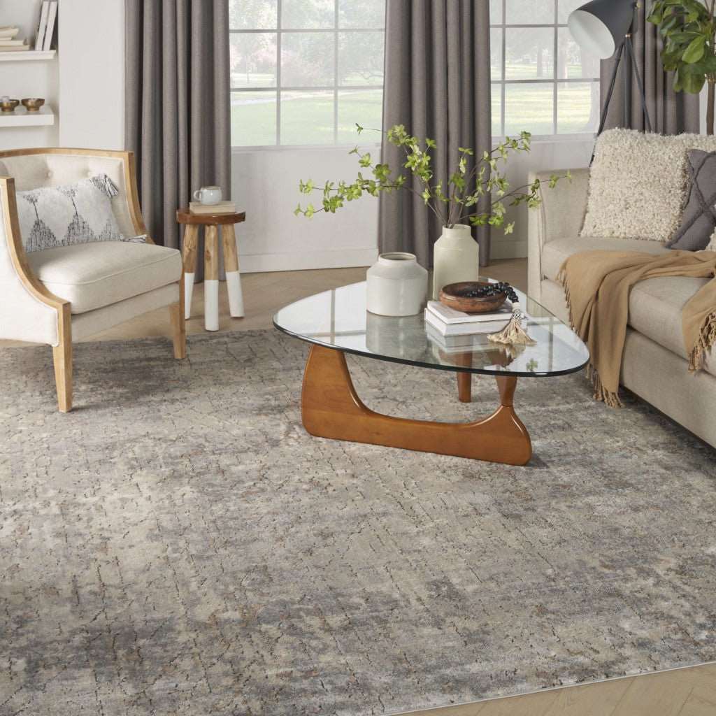 8' X 10' Beige and Gray Abstract Power Loom Area Rug - DraftFuel Sports